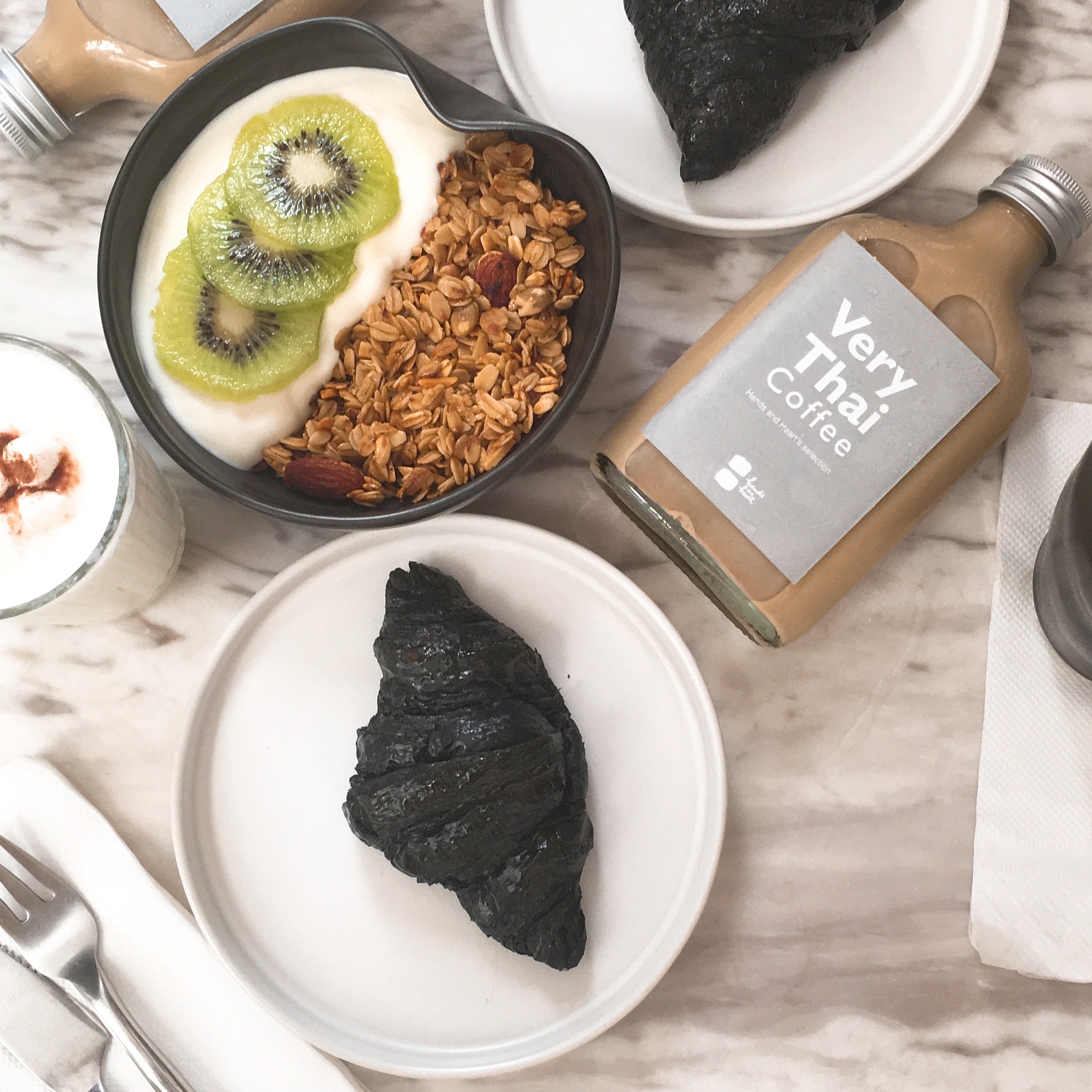 this was honestly the predecessor to the clean girl aesthetic - minimalist and monochromatic cafes with marble tables